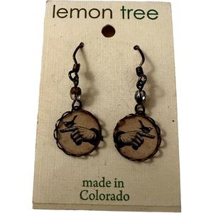 Cute beaded vintage style earrings. Cream and black.